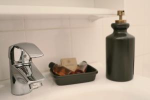 Appartements La Tour des Songes Place Dampmartin Uzes : photos des chambres