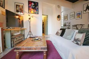 Appartements La Tour des Songes Place Dampmartin Uzes : photos des chambres