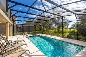 5 Bed ,South facing pool home, great amenities.