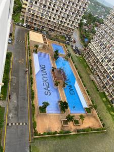 Studio with Balcony and Pool View in the Heart of Lapu-Lapu, Cebu