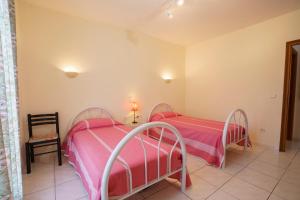 Appartements La Caletta Corsa Apartments con due camere a 100 m dal mare - WiFi fibra FTTH - ALL INCLUSIVE : photos des chambres