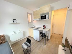 Appartements cosy studio Nanterre- La defense : photos des chambres