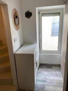 Maisons de vacances Charming house in village centre with terrace : photos des chambres