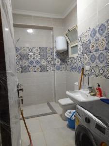 2 bedrooms apartment fully furnished air conditioned with great view and privet garden at degla palms compound located at 6 October city