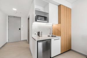 Essence Suites Taringa