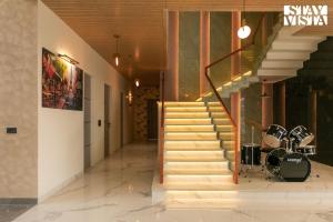 StayVista at Priana - A luxury Pool Villa with Gym