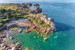 Maisons de vacances Evasion aux Caraibes Bretonnes - Votre havre de paix a Perros Guirec : photos des chambres