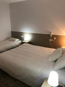 Hotels Hotel du Clocher : photos des chambres
