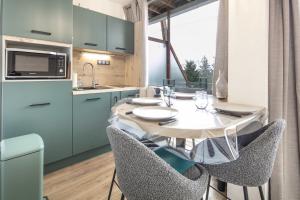 Appartements Le Manchot - Au pied des remontees mecaniques : photos des chambres