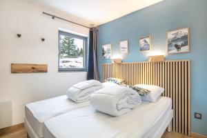 Appartements Le Manchot - Au pied des remontees mecaniques : photos des chambres