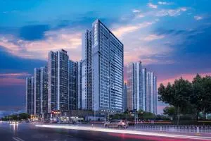 壹家国际酒店欢乐谷武钢体育馆店 - Shekow