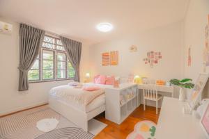 Manim House - บ้านพักในนิมมานพร้อมไวไฟ