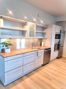 IM Apartments - with private jacuzzi and sauna in the heart of Vaasa