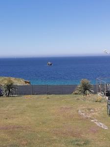 Maisons de vacances La maison de la plage 4 etoiles en front de mer SPA interieur GR34 : photos des chambres