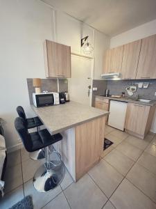 Appartements Studio en plein coeur de Fontainebleau, chateau a 3 minutes a pieds : photos des chambres