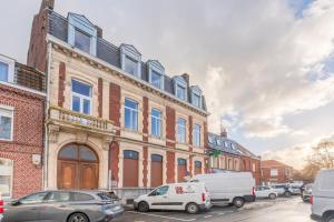 Appartements Studio equipe cote cour, parking gratuit : photos des chambres
