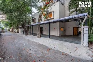 StayVista at Serenity Skies Apartment with Pool - Gangāpur