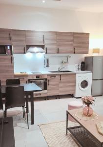 Appartements Le Cocon Palmier : photos des chambres