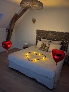 Maisons de vacances La Grange Clyna - Love Room : photos des chambres
