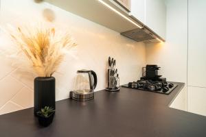Sleek & Modern 1BR with Luxury Pool in JVC