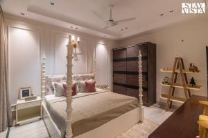 StayVista at Meadow Muse with Outdoor Pool - Manesar