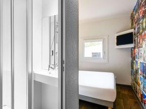 Hotels hotelF1 Nantes Ouest Saint-Herblain : photos des chambres