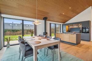 Stylish And Modern Holiday Home With Large Terraces And Private Bathing Jetty Just A Few Minutes Walk From The Child-Friendly Handrup Beach And