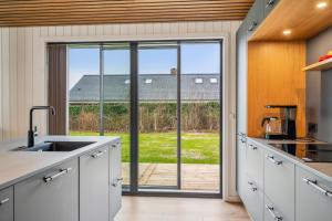 Stylish And Modern Holiday Home With Large Terraces And Private Bathing Jetty Just A Few Minutes Walk From The Child-Friendly Handrup Beach And