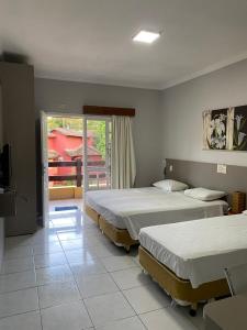 Flat Incrível Amarilis dentro da Riviera São Lourenço - Estúdio exclusivo, enxoval, wifi e serviço de praia