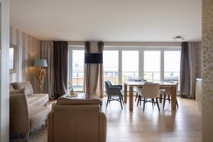 Premier Suite with Sea View room in Hotel Strand am Königshafen