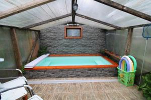 Estudio Interior con Baño Privado en Casa Frente al Mar Piscina temperada compartida