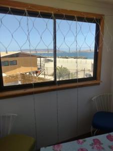 Casa Playa Loreto, familiar, ubicada a 120 metros de la playa, con maravillosa vista al mar, cercano a Caldera