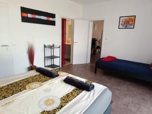 Appartements Grand Appartement 3 frontieres : photos des chambres