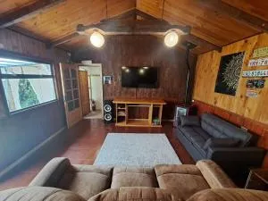 Habitación cocina y Quincho con Piscina temperada - Ralún