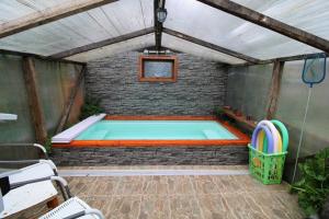 Habitación cocina y Quincho con Piscina temperada