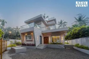 StayVista at Serenity Shores with Pool, Bonfire, Lawn - Sāhān