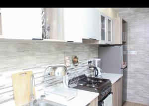 executive living apartment with heated swimming pool, modern equipped gym, private parking space and amazing scenic city views