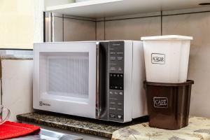 Casa confortável para Famílias e Grupos com Ar-condicionado em Praia Grande