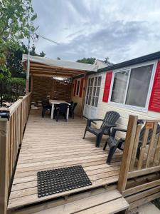 Campings Les mobil homes de NOLY, 1 Place adulte Reserve Africaine de Sigean gratuite : photos des chambres