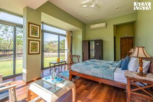 StayVista at Beyond Infinity with Hill View, BBQ