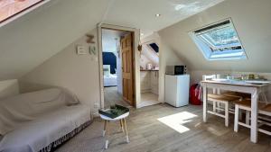 Appartements Terre & Mer-veilles 2, appartement avec SPA pour 2 personnes : photos des chambres
