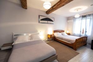 Appartements Chambre Familiale du Couvent : photos des chambres