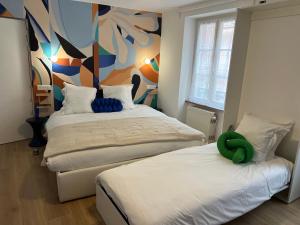 Appartements Gite See You Soon - Studio Wood : photos des chambres