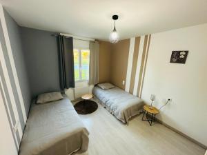 Maisons de vacances La Maison Jumelle ELM Tonneins : photos des chambres