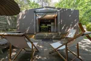 Lodges Lodging Le Lac : Bungalow - Vue sur Jardin