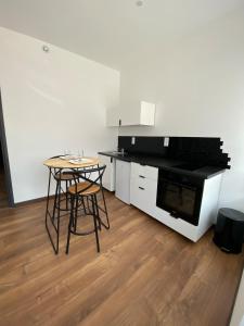 Appartements Douce Nuit & Spa : photos des chambres