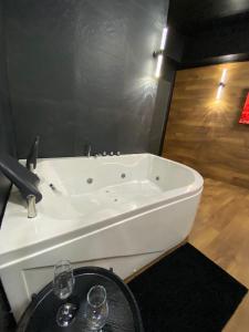 Appartements Douce Nuit & Spa : photos des chambres
