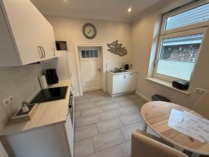 Ferienwohnung „Opa‘s Tohuus“mit Fahrrädern, Husum