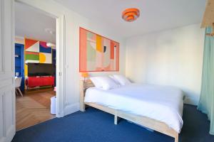 Appartements La vie en couleurs : photos des chambres