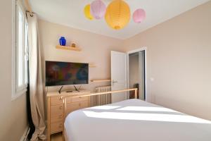 Appartements La vie en couleurs : photos des chambres